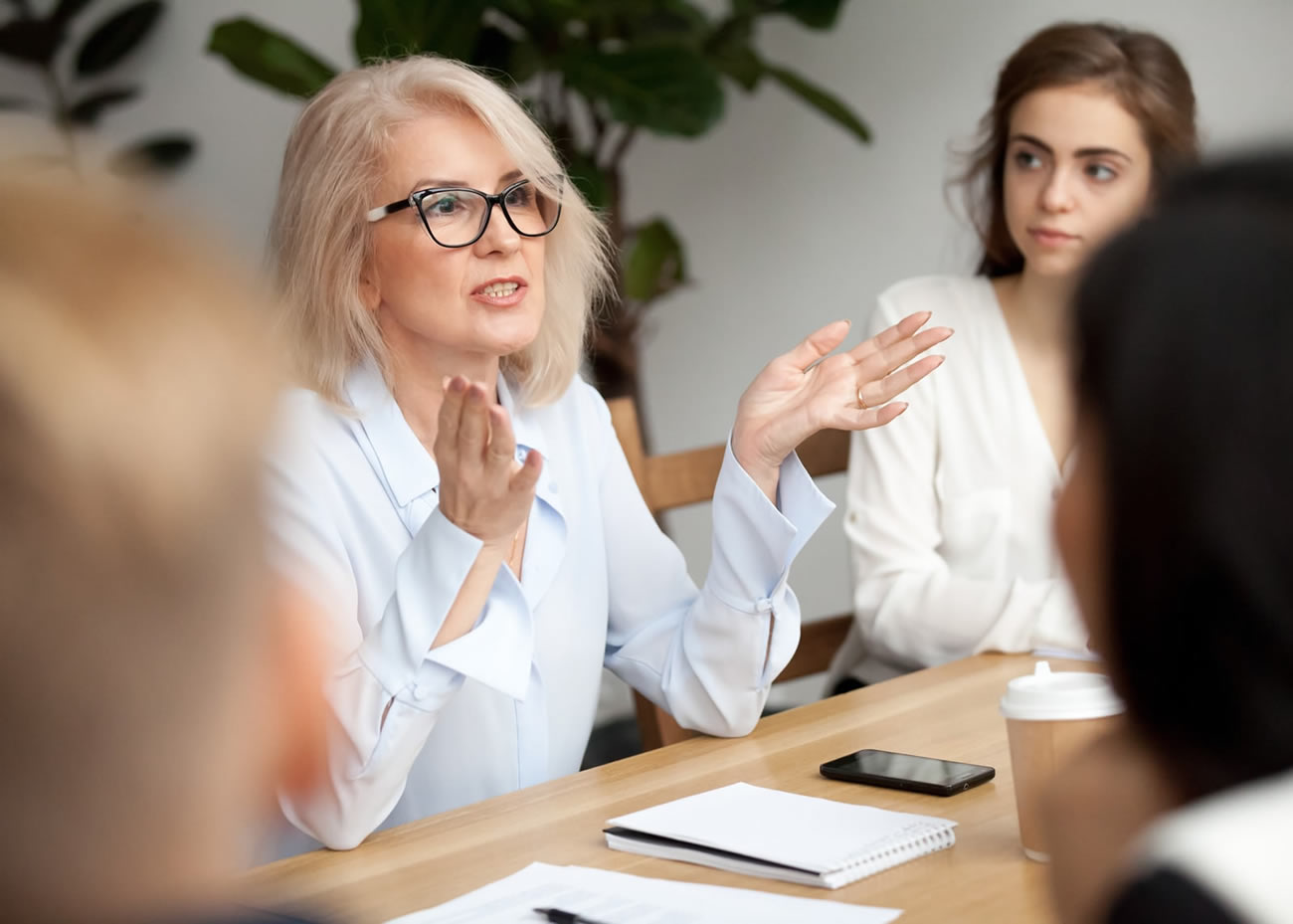 naem-2018-article-attractive-aged-businesswoman-teacher-mentor-coach-700x500