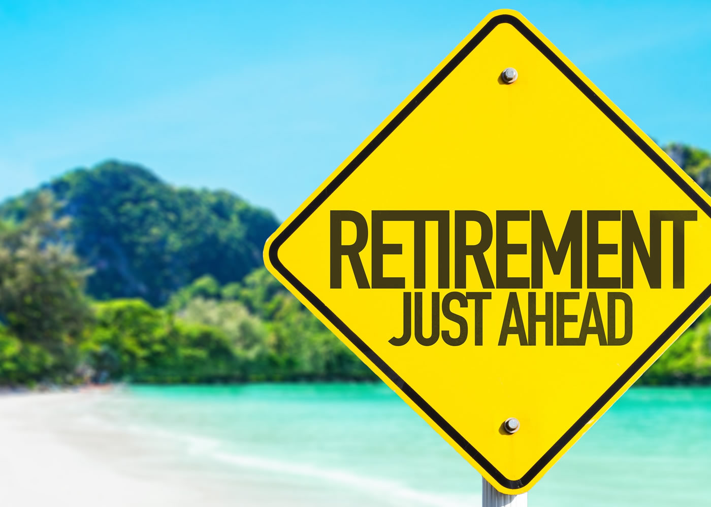 naem-2018-article-retirement-just-ahead-sign-beach-background-700x500