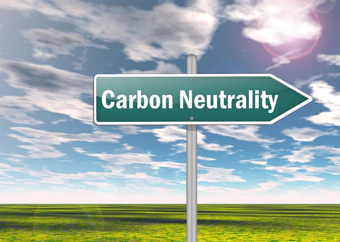 naem-2018-blog-signpost-carbon-neutrality-700x500wording-